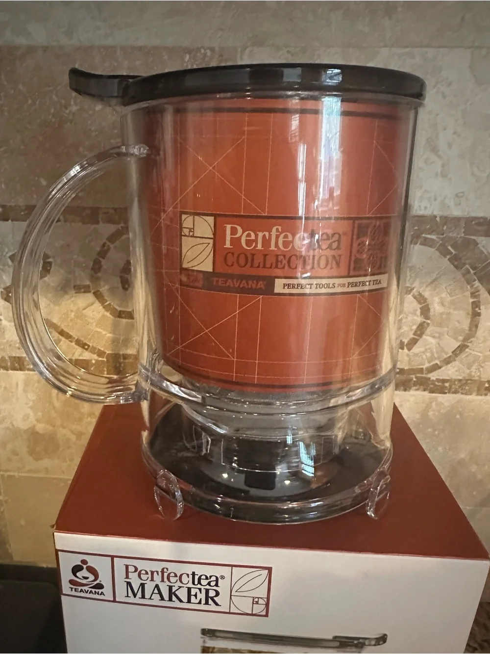 Teavana Logo Graphic in Mint and Dark Brown on Coral